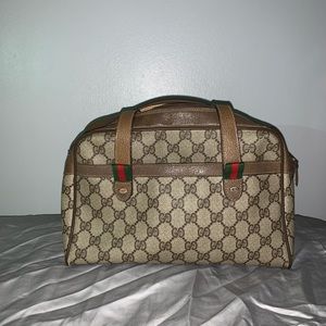 Gucci women’s handbag (authentic Gucci with tags)